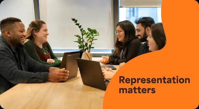 A photo of a diverse team of employees collaborating in the office. It has a text overlay that says Representation matters.