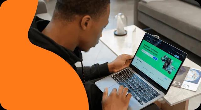 A photo of a man looking at the Trustpilot website